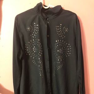 A long sleeve, navy blue blouse